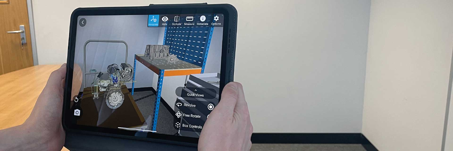 Multiple 3D models being visualized on the Theorem-AR tablet app.