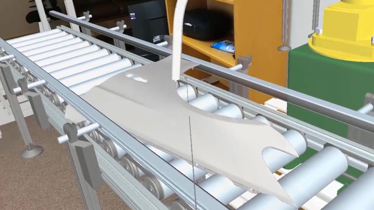 Conveyor system and robot visualized at full scale using HoloLens 2 mixed reality